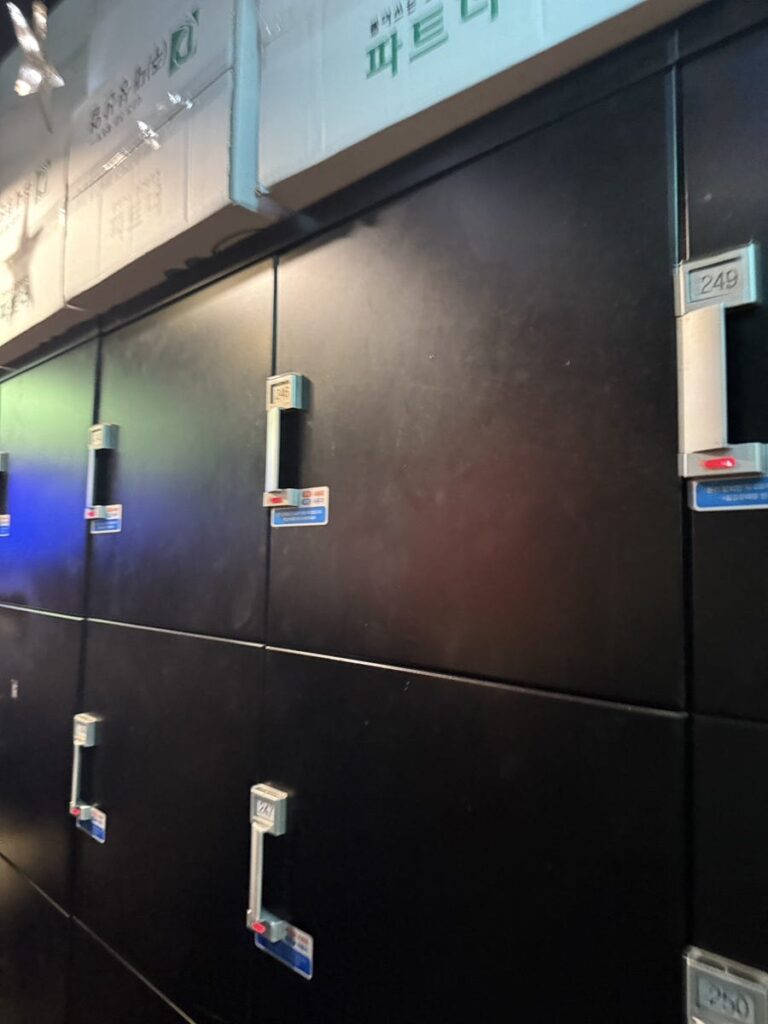 Rows of black lockers near the entrance