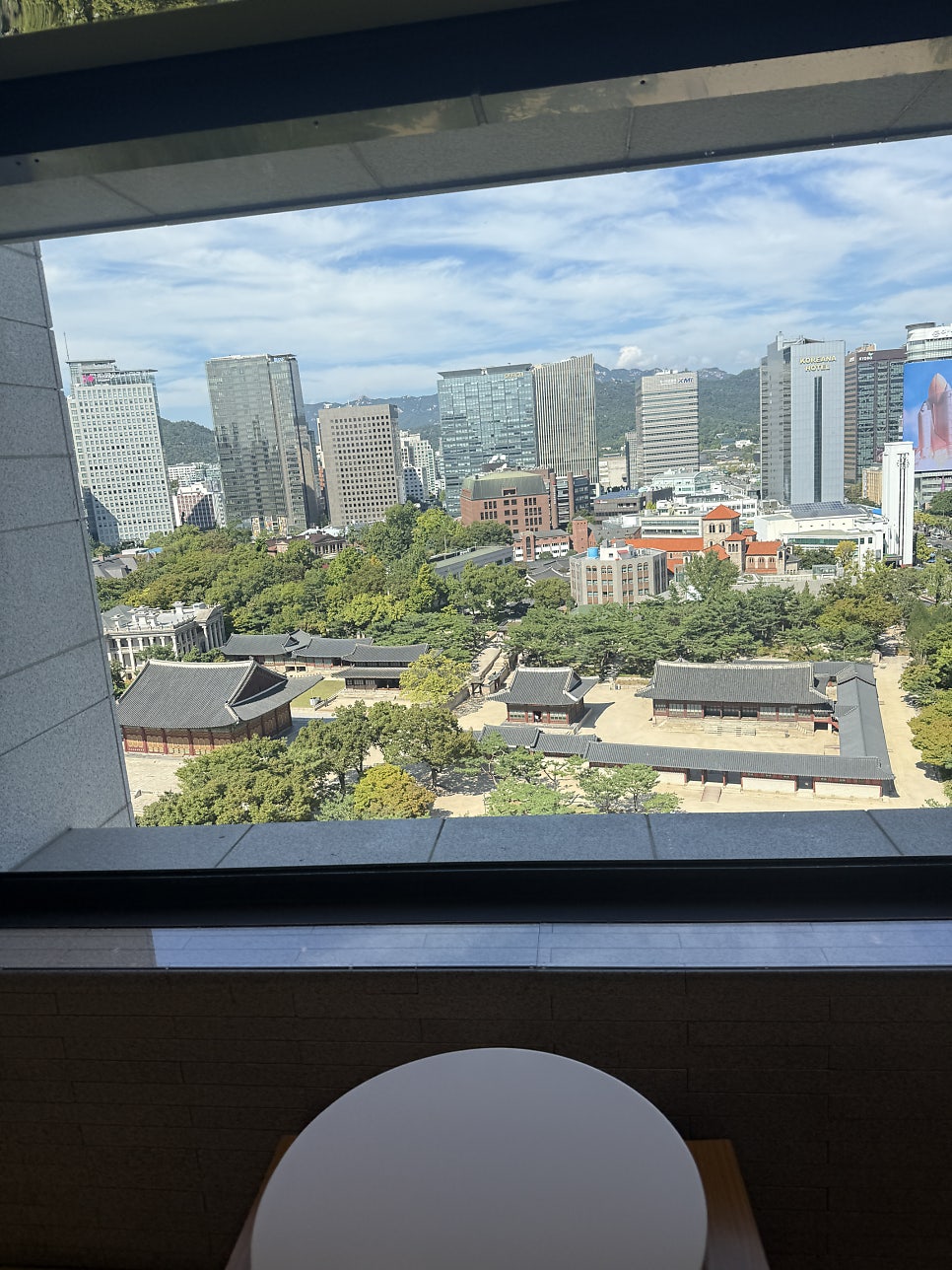 Cafe Darak, City Hall: A 13th-Floor Café Overlooking Deoksugung Palace (₩3,500 Americano)