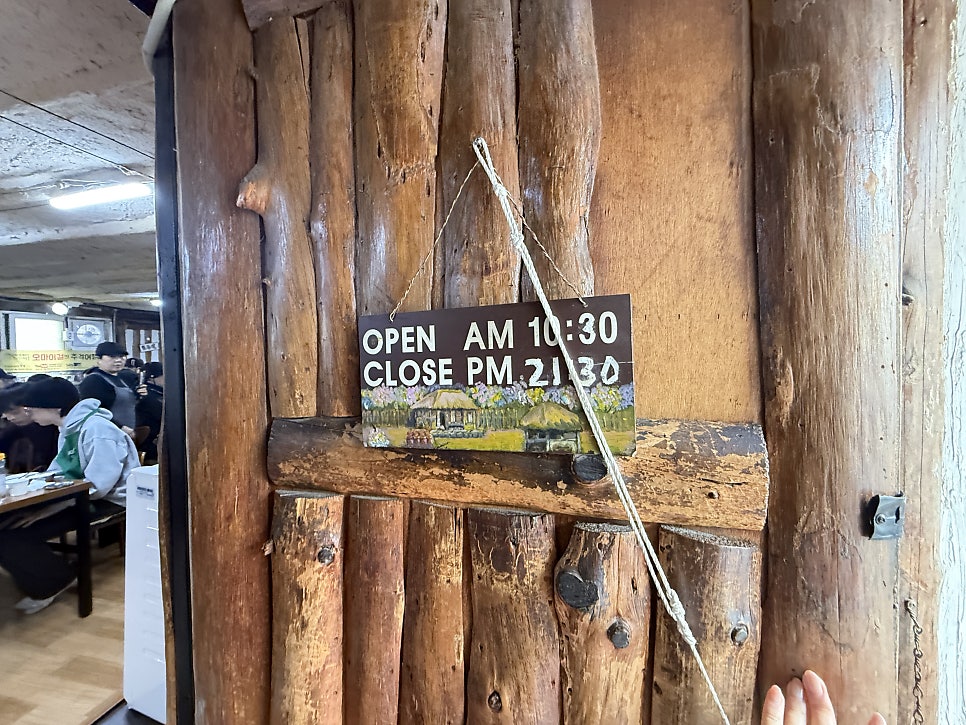 Opening hours posted on the door