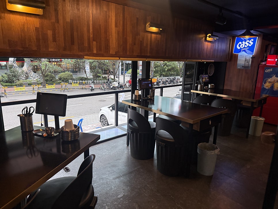 Bar seats and tables on the first floor