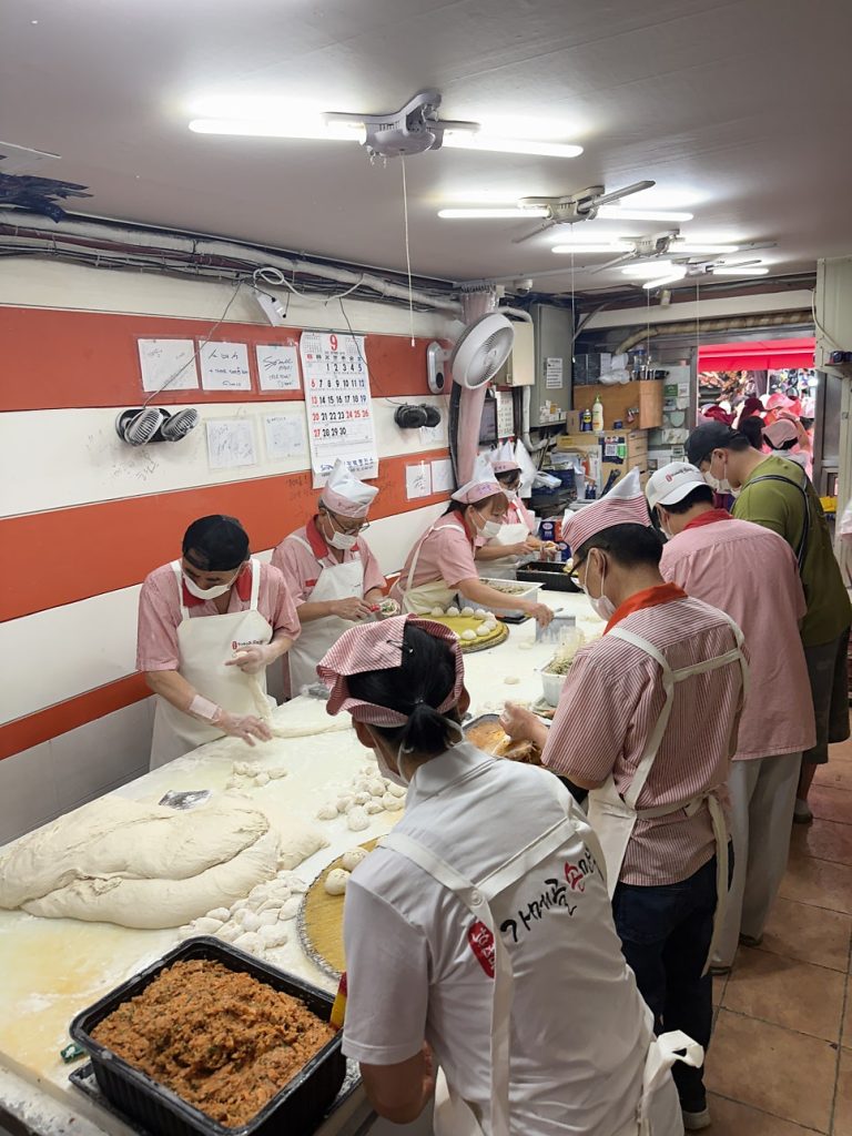 Freshly folded giant dumplings lined up