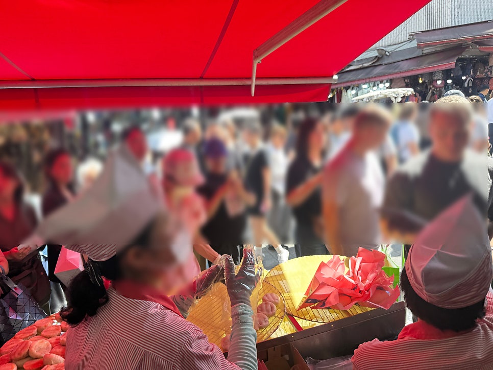 Long takeout line outside the dumpling shop