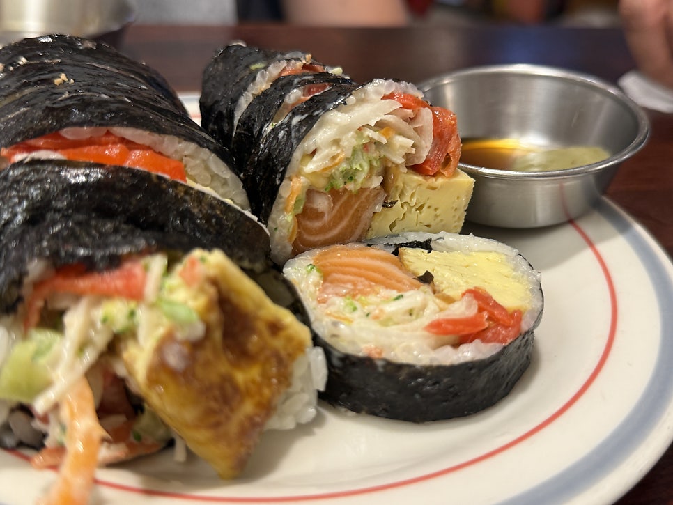 Salmon gimbap with thick slices of fresh salmon and egg