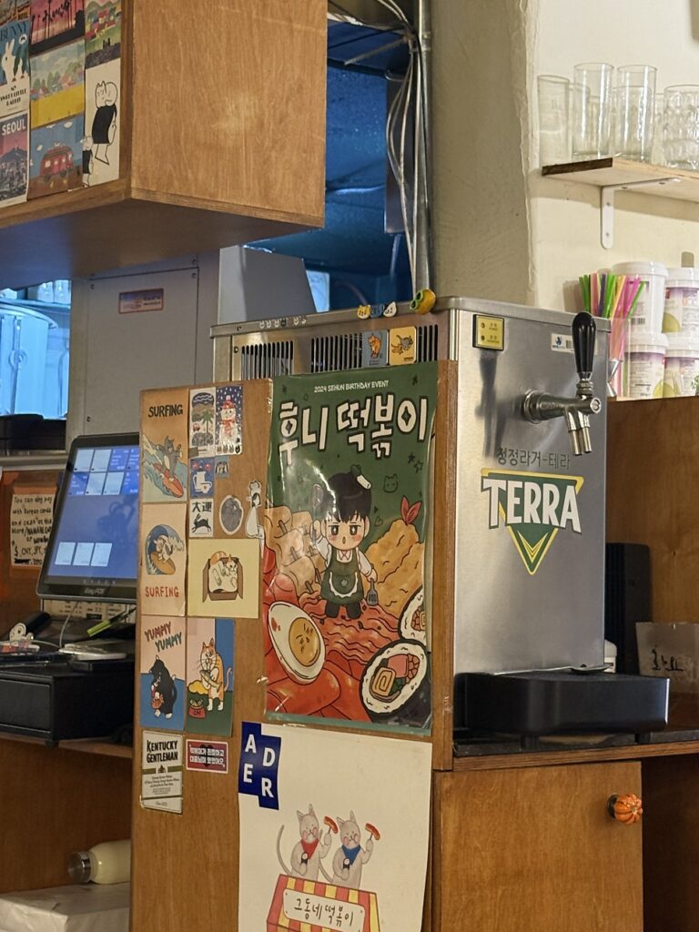 Counter with a Terra draft beer tap at Geudongne Tteokbokki