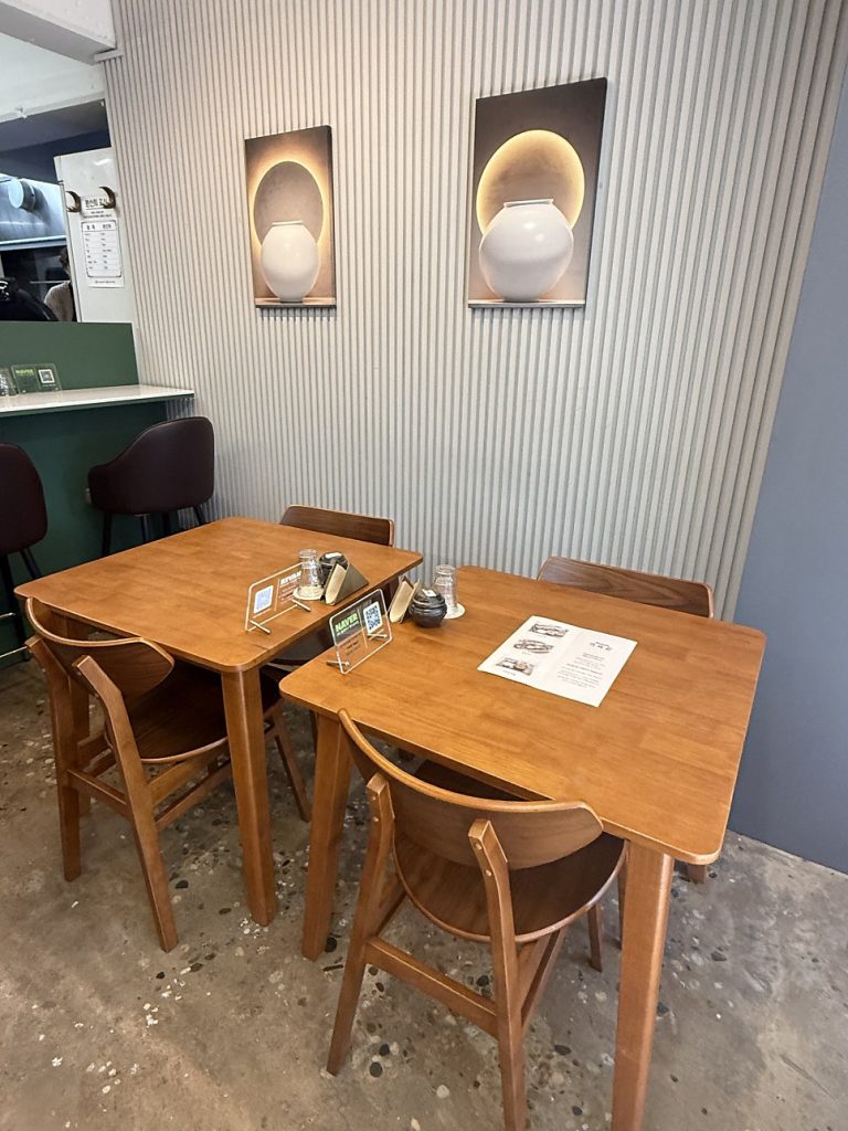 Wooden tables inside Giwadon