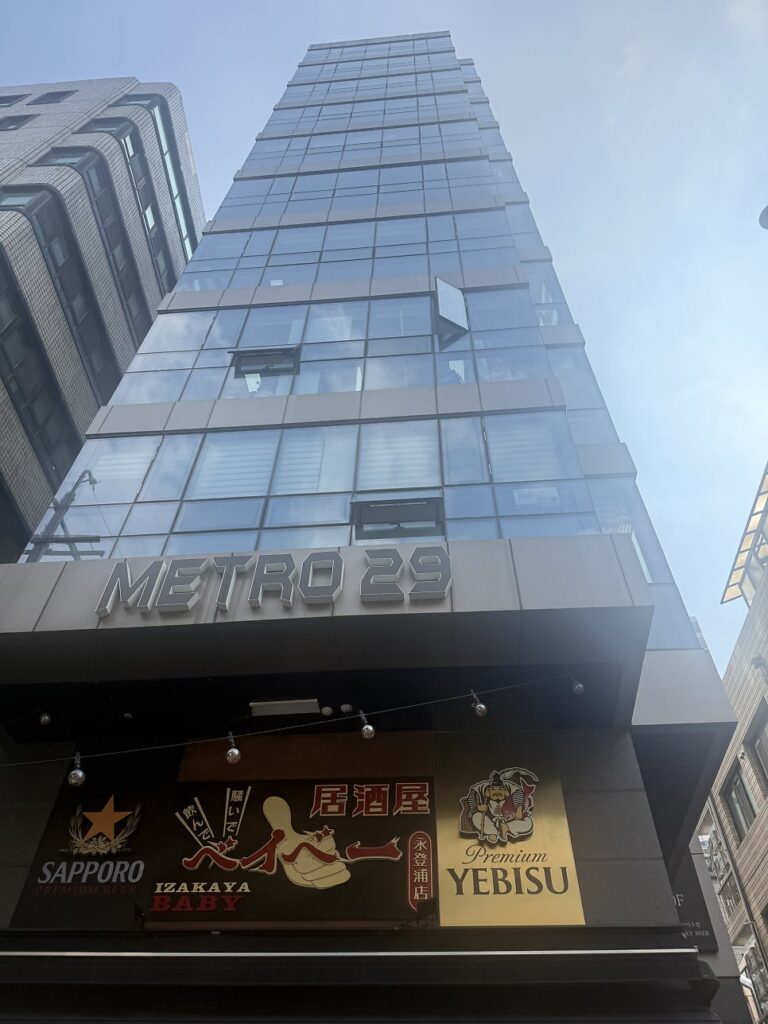 METRO 29 glass building with an izakaya on the ground floor