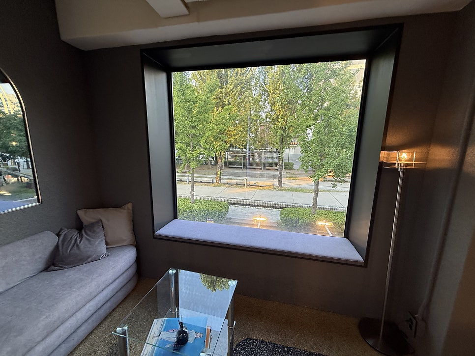 Window sofa seat looking out on the trees