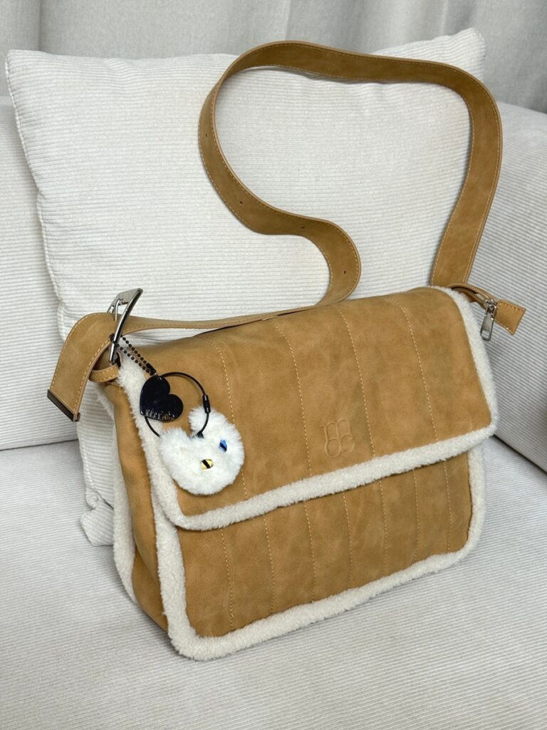 Camel suede-look crossbody bag with white fleece trim