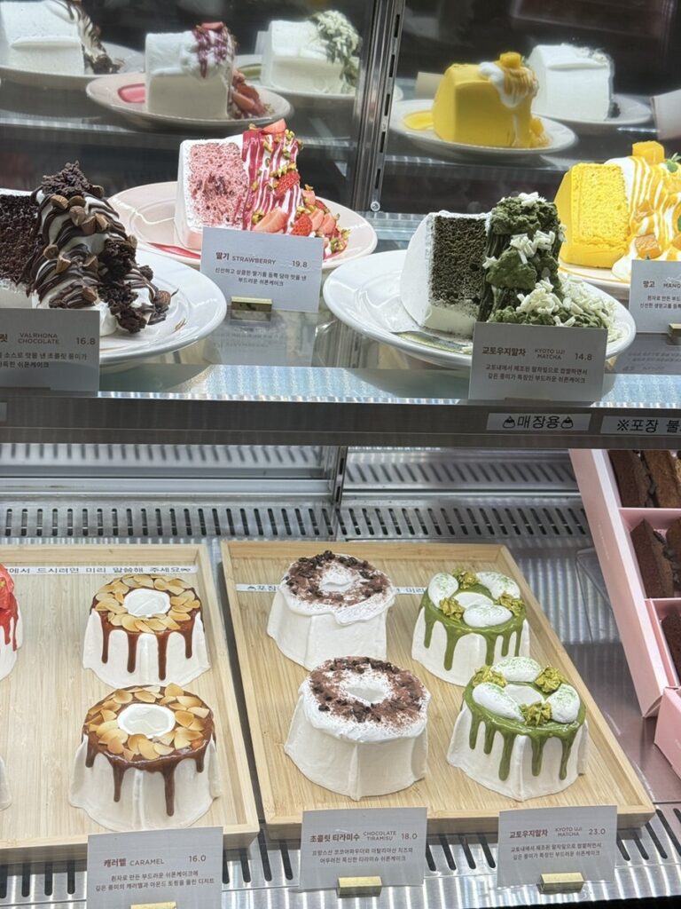 Chiffon cake slices and matcha cakes in the glass case