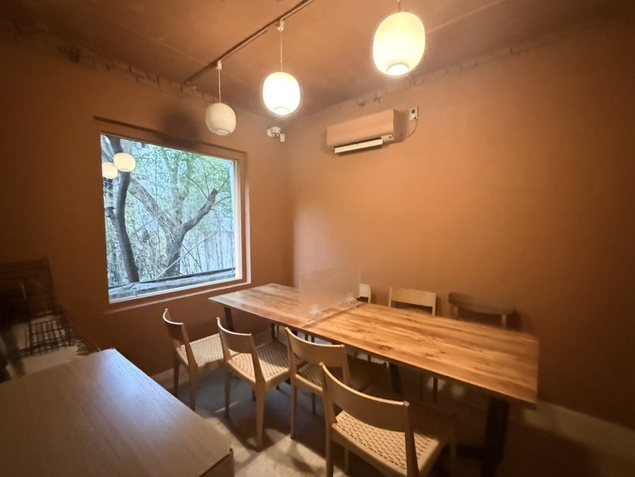 Small separate room with a long wooden table
