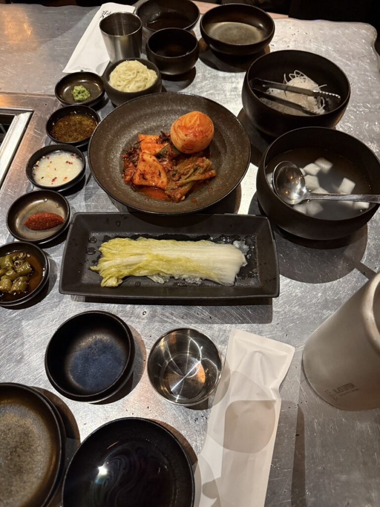 Table set with kimchi, sauces and side dishes