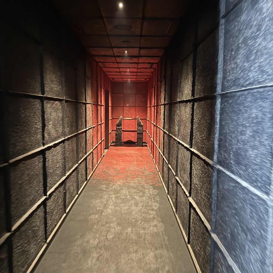 Long red-lit corridor leading into Mongtan Aewol