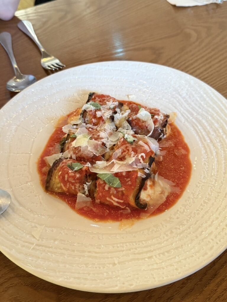 Melanzane, eggplant rolls with mozzarella in tomato sauce