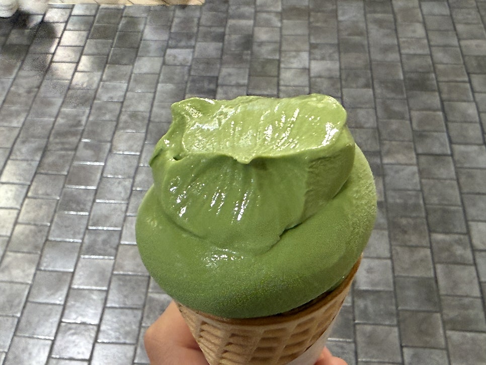 Close-up of the deep green matcha soft serve