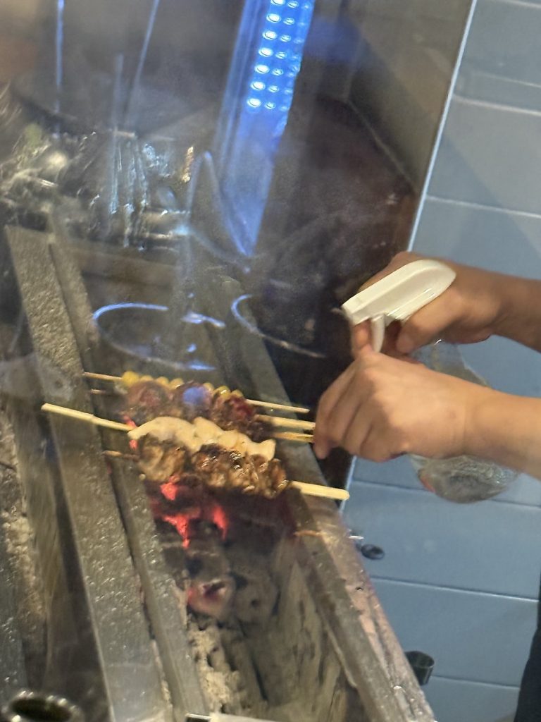 Yakitori being grilled to order