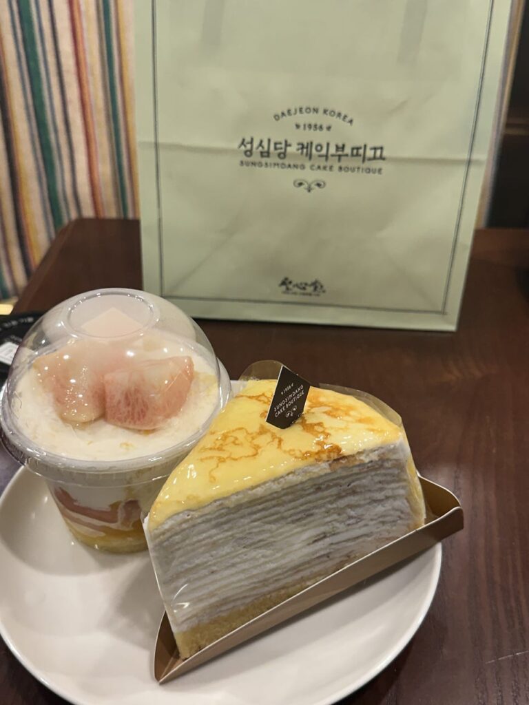 Yogurt Peach cup and crêpe cake slice on a plate