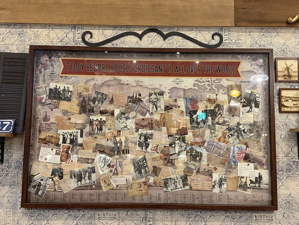 Walls covered with Paris postcards and old photos