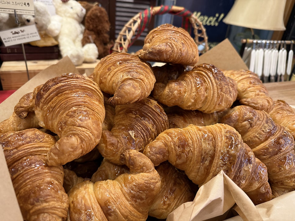 Croissants piled high on the display