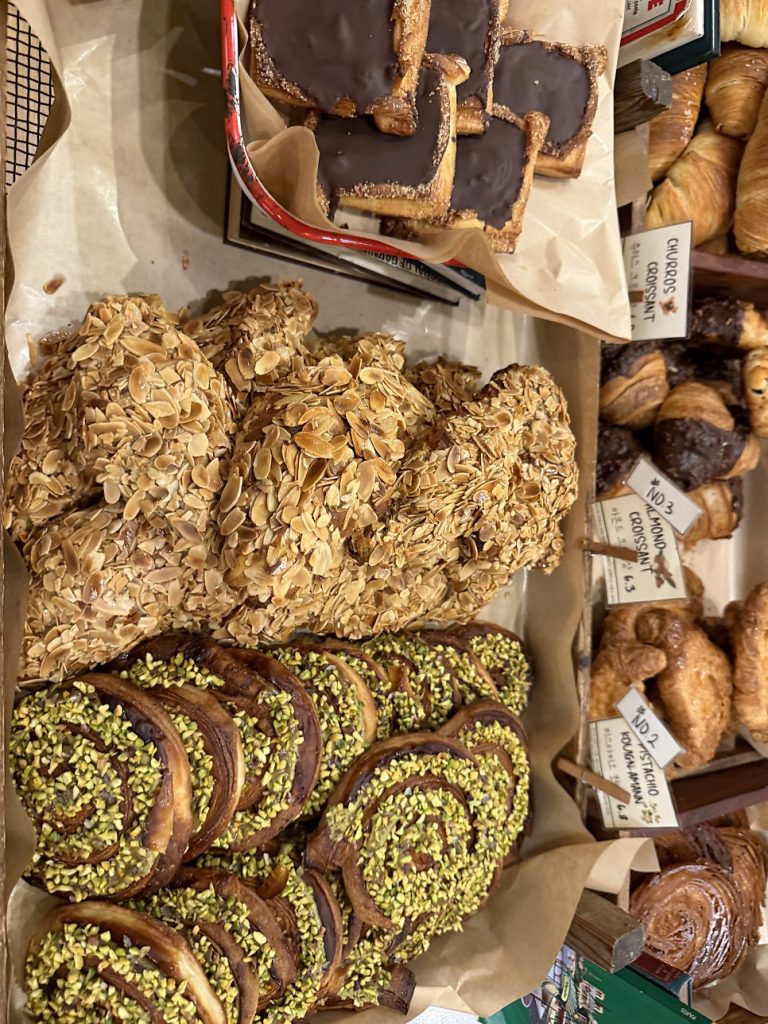 Pistachio kouign-amann and almond croissants