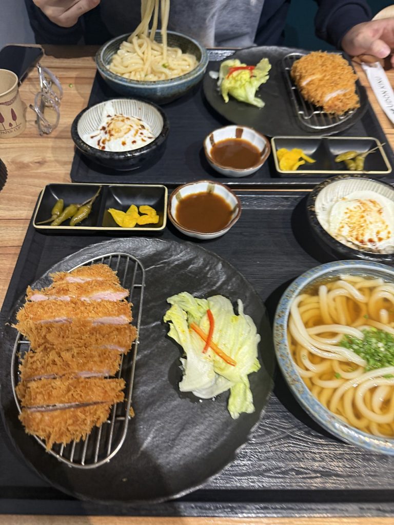 Tonkatsu set on a tray with udon and egg rice