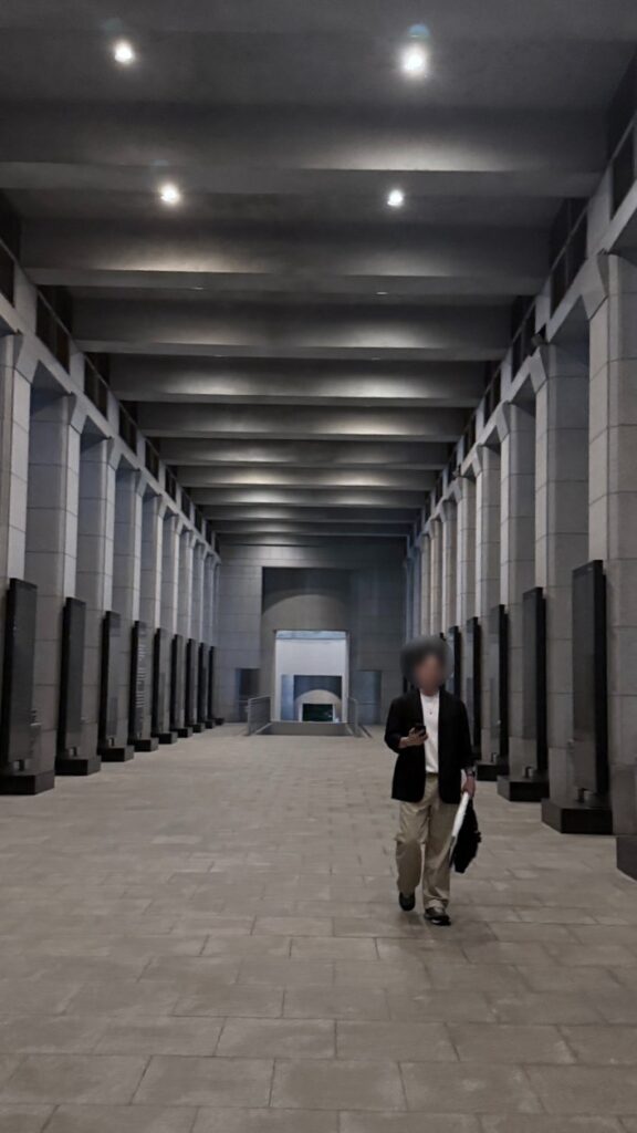 Long, quiet colonnade at the War Memorial of Korea in the evening